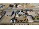 Aerial view of house with solar panels, landscaped yard, and driveway at 1761 Augusta St, Pahrump, NV 89048