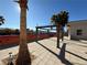 Outdoor patio area with pergola and tile flooring at 1761 Augusta St, Pahrump, NV 89048