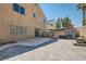 Backyard with a patio, fire pit, and covered seating area at 2108 Royal Antilles Ct, North Las Vegas, NV 89031