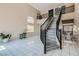 Elegant entryway with a curved staircase and high ceilings at 2108 Royal Antilles Ct, North Las Vegas, NV 89031