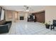 Living room with fireplace and access to kitchen at 2108 Royal Antilles Ct, North Las Vegas, NV 89031