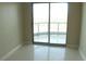 Bright bedroom with sliding glass doors to balcony at 222 Karen Ave # 2708, Las Vegas, NV 89109