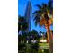 Luxury high-rise building at dusk with palm trees at 222 Karen Ave # 2708, Las Vegas, NV 89109