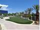 Landscaped putting green with winding path at 222 Karen Ave # 2708, Las Vegas, NV 89109