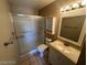 Bathroom with shower/tub combo, vanity, and mirror at 2235 High Dunes Ln, Laughlin, NV 89029