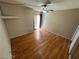 Bedroom with wood flooring and sliding glass door to patio at 2235 High Dunes Ln, Laughlin, NV 89029