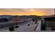 Scenic view of mountains and neighborhood at sunset at 2235 High Dunes Ln, Laughlin, NV 89029