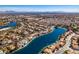 Aerial view of lakefront community, showcasing homes and landscape at 2469 Sun Reef Rd, Las Vegas, NV 89128