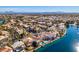 Luxury homes and lake with distant city skyline views at 2469 Sun Reef Rd, Las Vegas, NV 89128