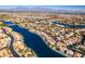 Aerial view of lakefront community with luxury homes at 2469 Sun Reef Rd, Las Vegas, NV 89128