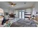 Main bedroom with wood floors, fireplace, and exercise bike at 2469 Sun Reef Rd, Las Vegas, NV 89128