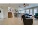 Gathering room with tiled floors, a fireplace, and built-in shelving at 2469 Sun Reef Rd, Las Vegas, NV 89128