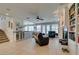 Gathering room with a fireplace, built-in shelving, and tiled floors at 2469 Sun Reef Rd, Las Vegas, NV 89128