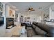 Open living room with a fireplace and built-in shelving at 2469 Sun Reef Rd, Las Vegas, NV 89128