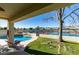 Relaxing pool area with lake view, perfect for entertaining at 2469 Sun Reef Rd, Las Vegas, NV 89128