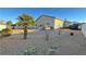 Landscaped backyard with patio, grill, and plenty of space at 2558 Sparrow Way, Pahrump, NV 89048