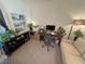 Home office with desk, chair, and ample storage; ideal workspace at 2558 Sparrow Way, Pahrump, NV 89048