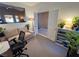 Bright home office featuring a desk, comfortable seating and built-in shelving at 2558 Sparrow Way, Pahrump, NV 89048