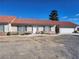 Front view of a ranch-style home with a red tile roof and attached garage at 2651 Homestead Rd, Pahrump, NV 89048