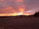 Stunning sunset view over the mountains and desert landscape at 2651 Homestead Rd, Pahrump, NV 89048