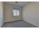 Spacious bedroom with a window offering natural light at 2693 Hollowvale Ln, Henderson, NV 89052