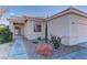 House exterior showcasing walkway, landscaping, and entryway at 2693 Hollowvale Ln, Henderson, NV 89052