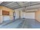 Two-car garage with overhead storage and work bench at 2693 Hollowvale Ln, Henderson, NV 89052