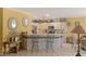 Kitchen with an island, stainless steel appliances, and light-colored cabinets at 2707 White Sage Dr, Henderson, NV 89052