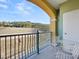 Spacious balcony with scenic mountain views and seating area at 30 Strada Di Villaggio # 339, Henderson, NV 89011