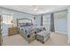 Serene bedroom featuring a comfortable bed and ottoman at 3065 Lenoir St, Las Vegas, NV 89135