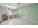 Simple bedroom with tiled floors and neutral walls at 3091 Liberty Cir, Las Vegas, NV 89121