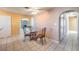 Small dining area with glass table and chairs at 3091 Liberty Cir, Las Vegas, NV 89121