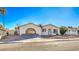 Ranch style home with carport and landscaped yard at 3091 Liberty Cir, Las Vegas, NV 89121