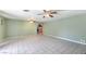 Living room with tile floors and access to kitchen and hallway at 3091 Liberty Cir, Las Vegas, NV 89121