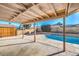 Relaxing pool area with patio cover offering shade at 3091 Liberty Cir, Las Vegas, NV 89121