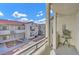 Balcony view of condo complex with courtyard and landscaping at 3318 N Decatur Blvd # 2047, Las Vegas, NV 89130