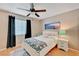 Well-lit bedroom with a white bed frame at 3318 N Decatur Blvd # 2047, Las Vegas, NV 89130