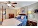 Charming bedroom with a post bed and dresser at 3318 N Decatur Blvd # 2047, Las Vegas, NV 89130