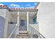 Exterior view of condo building with stairs leading to private entrance at 3318 N Decatur Blvd # 2047, Las Vegas, NV 89130