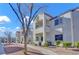 Exterior of a light-colored building with walkway and landscaping at 3318 N Decatur Blvd # 2047, Las Vegas, NV 89130