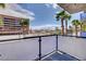 Balcony with view of city skyline and palm trees at 353 E Bonneville Ave # 103, Las Vegas, NV 89101