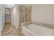 Spa-like bathroom with soaking tub and walk-in shower at 353 E Bonneville Ave # 103, Las Vegas, NV 89101