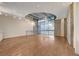 Open floor plan with hardwood floors and large windows at 353 E Bonneville Ave # 103, Las Vegas, NV 89101