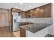 Sleek kitchen featuring stainless steel appliances and granite counters at 353 E Bonneville Ave # 103, Las Vegas, NV 89101