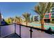 Stunning balcony view overlooking the community pool and palm trees at 353 E Bonneville Ave # 103, Las Vegas, NV 89101