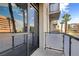 Step outside onto this private balcony with city views at 353 E Bonneville Ave # 181/281, Las Vegas, NV 89101