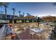 Outdoor grilling station and dining area with umbrellas at 353 E Bonneville Ave # 503, Las Vegas, NV 89101