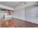 Living room with hardwood floors and exposed concrete wall at 353 E Bonneville Ave # 503, Las Vegas, NV 89101