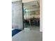 Stylish building lobby with glass doors and modern decor at 353 E Bonneville Ave # 503, Las Vegas, NV 89101