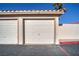 Attached garage with an automatic garage door at 3760 Desert Marina Dr # 67, Laughlin, NV 89029